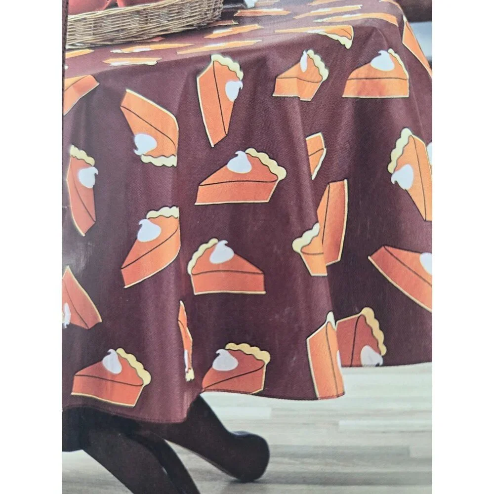 Celebrate Harvest PEVA Tablecloth 70 Inch Diameter Pumpkin Pie Print Round Table